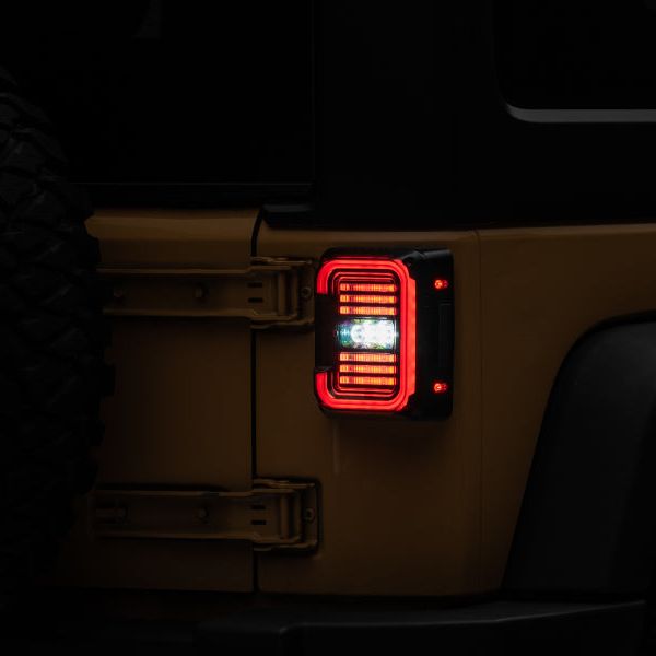 Raxiom J138358 - RAXJ138358 - Raxiom 07-18 Jeep Wrangler JK Axial Series LED Halo Tail Lights- Black Housing (Dark Smoked Lens) - Shipped in Europe - Tuningsupply.com