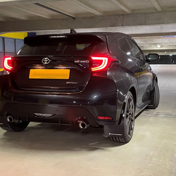 Rally Armor MF74-UR-BLK/WH - RALMF74-UR-BLK/WH - Rally Armor 20-25 Toyota GR Yaris Black Mud Flap w/White Logo - Shipped in Europe - Tuningsupply.com