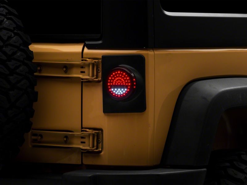 
    

Raxiom J164240 - RAXJ164240 - Raxiom 07-18 Jeep Wrangler JK Axial Series Halo LED Tail Lights- Black Housing (Clear Lens) - Shipped in Europe - Tuningsupply.com

  