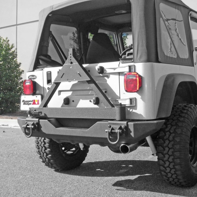 

Rugged Ridge  - RUG11546.42 - Rugged Ridge Tire Carrier XHD Rear Bumper 76-06 Jeep CJ / Jeep Wrangler - Shipped in Europe - Tuningsupply.com
