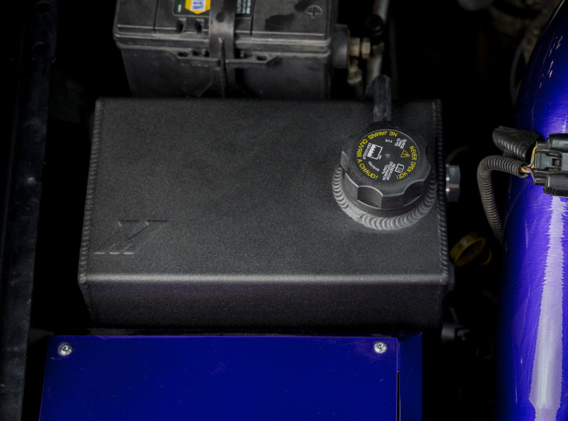 
  

Mishimoto MMRT-DMAX-01N - MISMMRT-DMAX-01N - Mishimoto 01-07 Chevy/GMC 6.6L Duramax Degas Tank - Natural - Shipped in Europe - Tuningsupply.com

