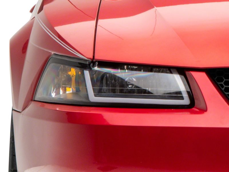 

Raxiom 422713 - RAX422713 - Raxiom 99-04 Ford Mustang Axial Series Headlights w/ Sequential LED Bar- Black Housing (Clear Lens) - Shipped in Europe - Tuningsupply.com
