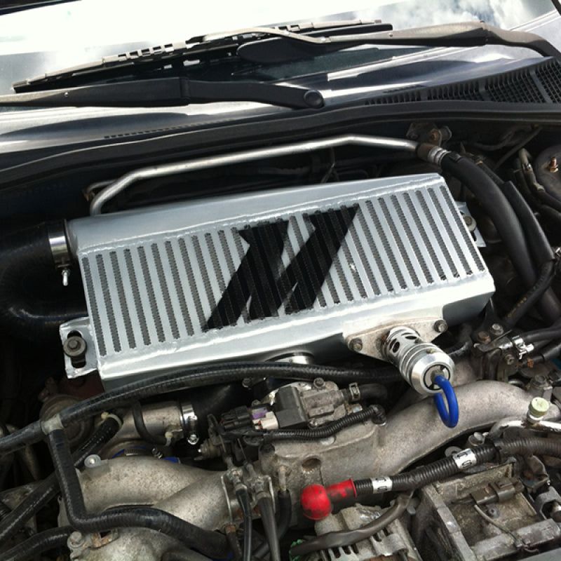 Mishimoto Subaru 02-07 WRX/04-07 STi Top-Mount Intercooler Kit - Silver/Black Hoses - Not For iRHD-tuningsupply.com