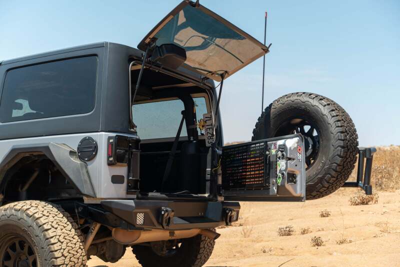 

DV8 Offroad TCJK-14 - DVETCJK-14 - DV8 07-18 Jeep Wrangler JK Body Mounted Tire Carrier - Shipped in Europe - Tuningsupply.com
