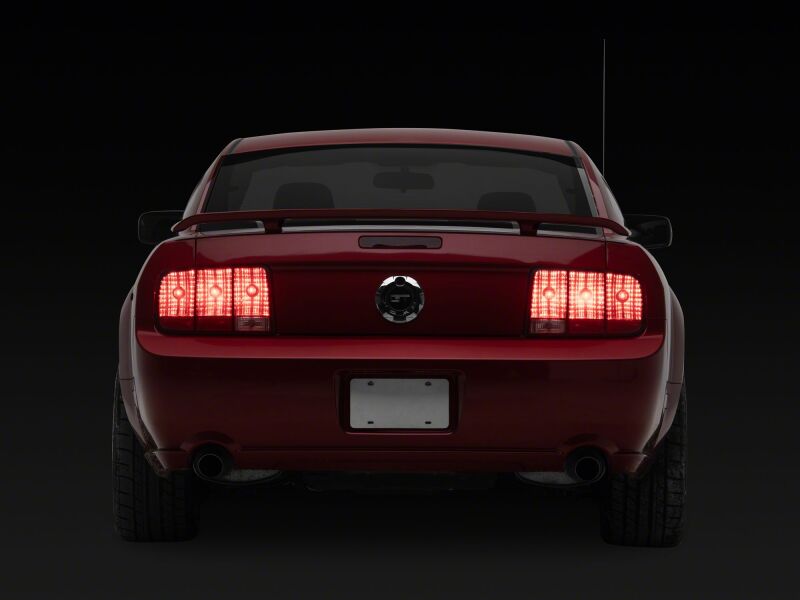 

Raxiom 460947 - RAX460947 - Raxiom 05-09 Ford Mustang Sequential Tail Light Kit- Plug-and-Play - Shipped in Europe - Tuningsupply.com
