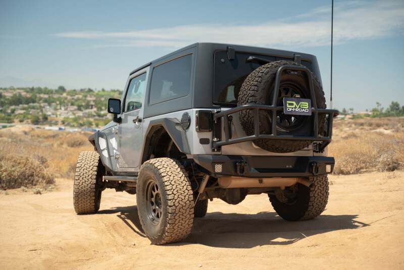 

DV8 Offroad TCJK-14 - DVETCJK-14 - DV8 07-18 Jeep Wrangler JK Body Mounted Tire Carrier - Shipped in Europe - Tuningsupply.com
