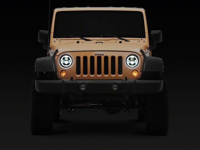 

Raxiom J178741 - RAXJ178741 - Raxiom 07-18 Jeep Wrangler Axial Series 7-Inch LED Headlights w DRL/ Black Housing - Clear Lens - Shipped in Europe - Tuningsupply.com
