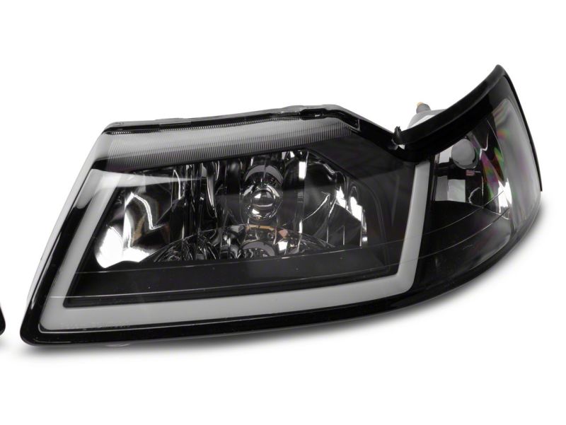 

Raxiom 422712 - RAX422712 - Raxiom 99-04 Ford Mustang Axial Series Headlights w/ LED Bar- Black Housing (Clear Lens) - Shipped in Europe - Tuningsupply.com
