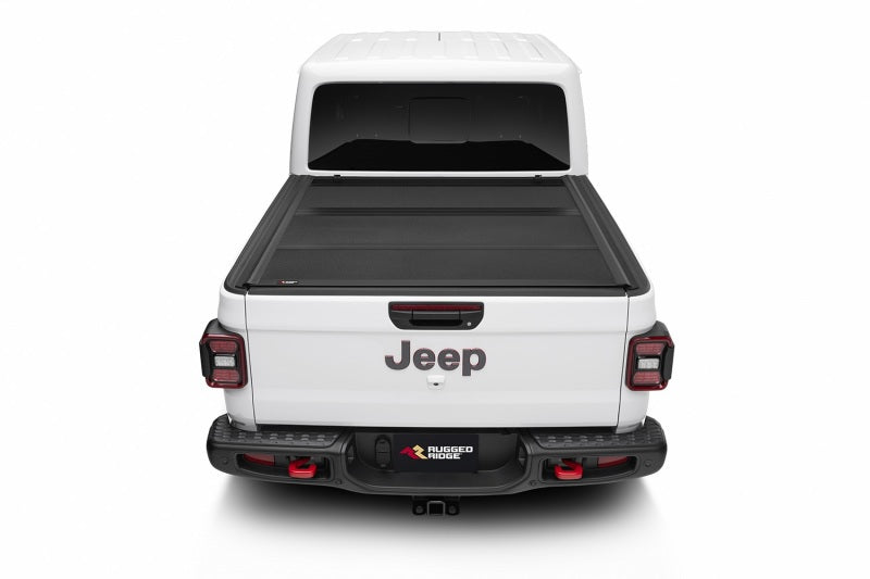 

Rugged Ridge 13550.24 - RUG13550.24 - Rugged Ridge Armis Hard Folding With LINE-X Bed Cover 2020 JT - Shipped in Europe - Tuningsupply.com
