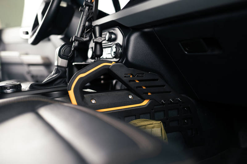 

DV8 Offroad CCBR-01 - DVECCBR-01 - DV8 21-23 Ford Bronco Center Console Molle Panels & Bridge - Shipped in Europe - Tuningsupply.com

