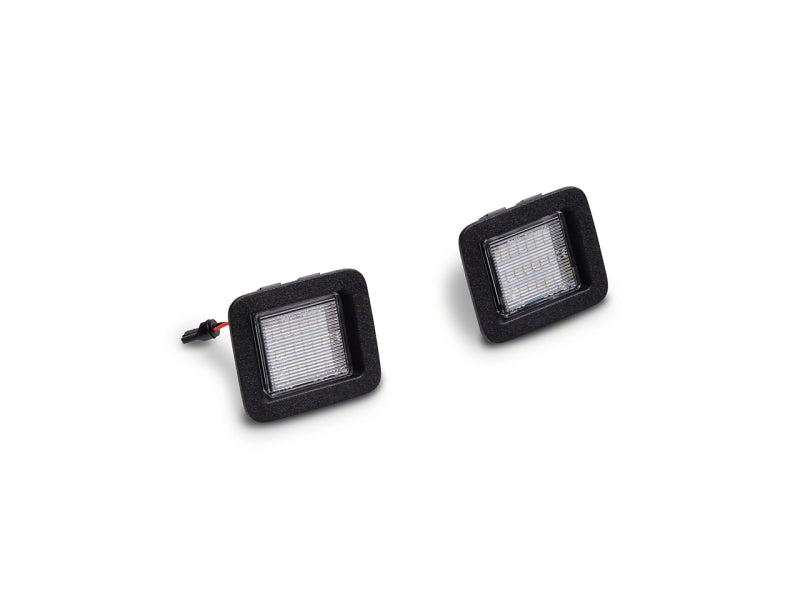 

Raxiom T542565 - RAXT542565 - Raxiom 15-23 Ford F-150 Axial Series LED License Plate Lamps - Shipped in Europe - Tuningsupply.com
