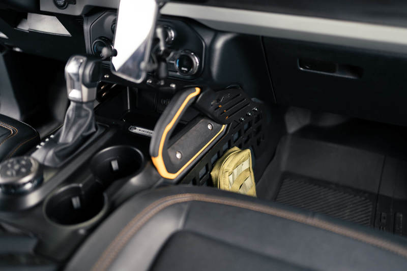 

DV8 Offroad CCBR-01 - DVECCBR-01 - DV8 21-23 Ford Bronco Center Console Molle Panels & Bridge - Shipped in Europe - Tuningsupply.com
