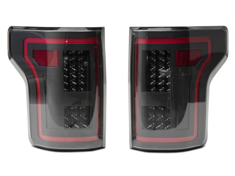 

Raxiom T544625 - RAXT544625 - Raxiom 15-17 Ford F-150 LED Tail Lights w/ SEQL Turn Signals- Black Housing (Clear Lens) - Shipped in Europe - Tuningsupply.com
