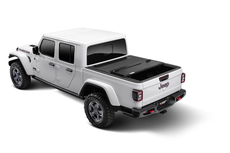 

Rugged Ridge 13550.24 - RUG13550.24 - Rugged Ridge Armis Hard Folding With LINE-X Bed Cover 2020 JT - Shipped in Europe - Tuningsupply.com
