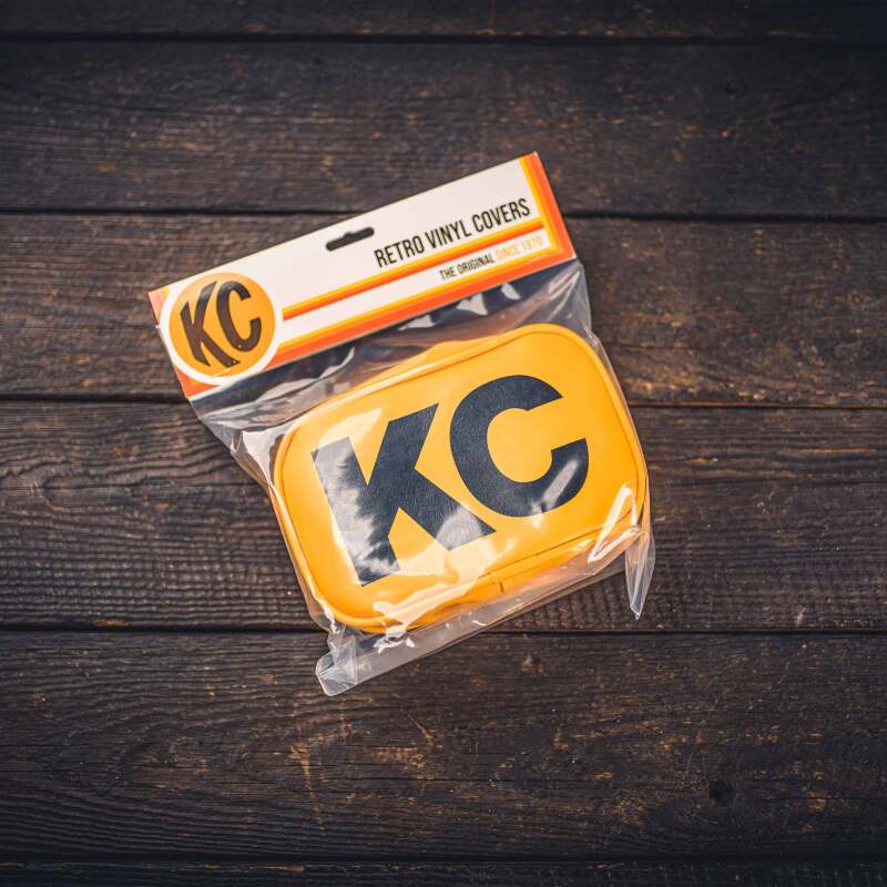 KC HiLiTES Retro 5in x 7in Rectangular Yellow Vinyl Light Cover w/ Black KC Logo (Pair)-tuningsupply.com