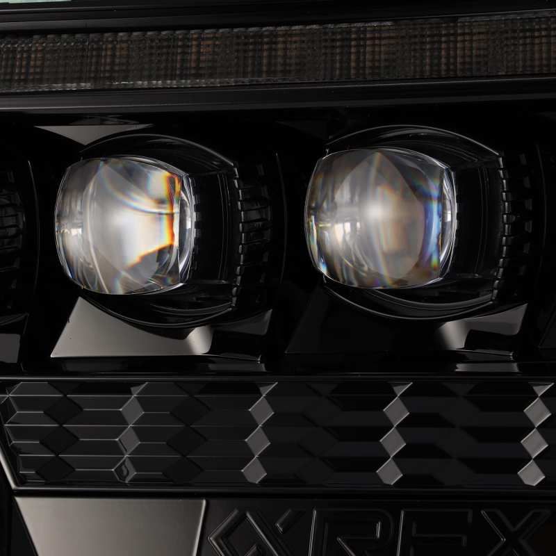 AlphaRex 12-15 Toyota Tacoma NOVA LED Proj Headlights Plank Alpha Blk w/Activ Light/Seq Signal/DRL-tuningsupply.com