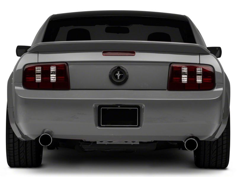 

Raxiom 49117 - RAX49117 - Raxiom 05-09 Ford Mustang Coyote Tail Lights- Black Housing (Smoked Lens) - Shipped in Europe - Tuningsupply.com
