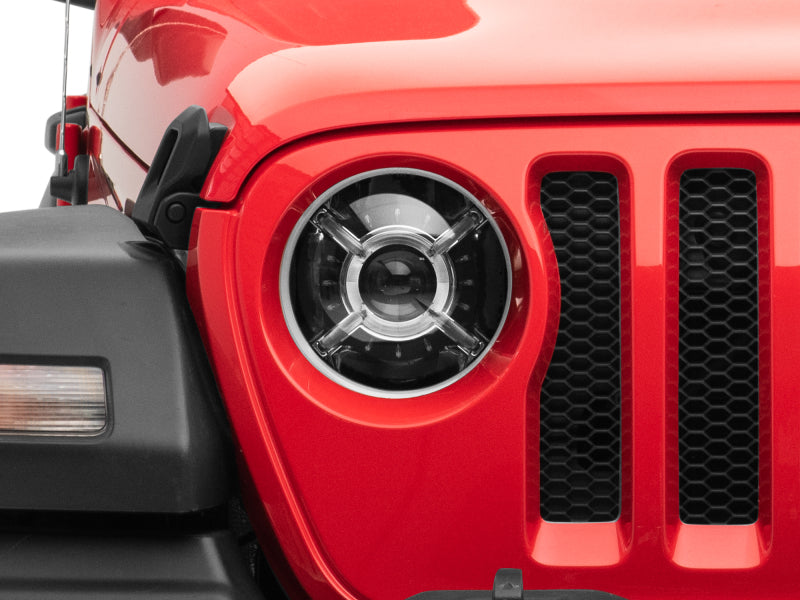 

Raxiom J137646 - RAXJ137646 - Raxiom 18-22 Jeep Wrangler JL/ JT 9-Inch LED Headlights w/ DRL and Halo- Black Housing (Clear Lens) - Shipped in Europe - Tuningsupply.com
