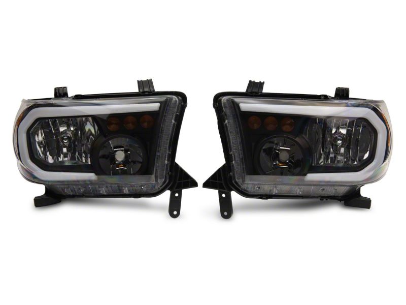 

Raxiom TU16004 - RAXTU16004 - Raxiom 07-13 Toyota Tundra Axial Series Headlights w/ LED Bar- Black Housing (Clear Lens) - Shipped in Europe - Tuningsupply.com

