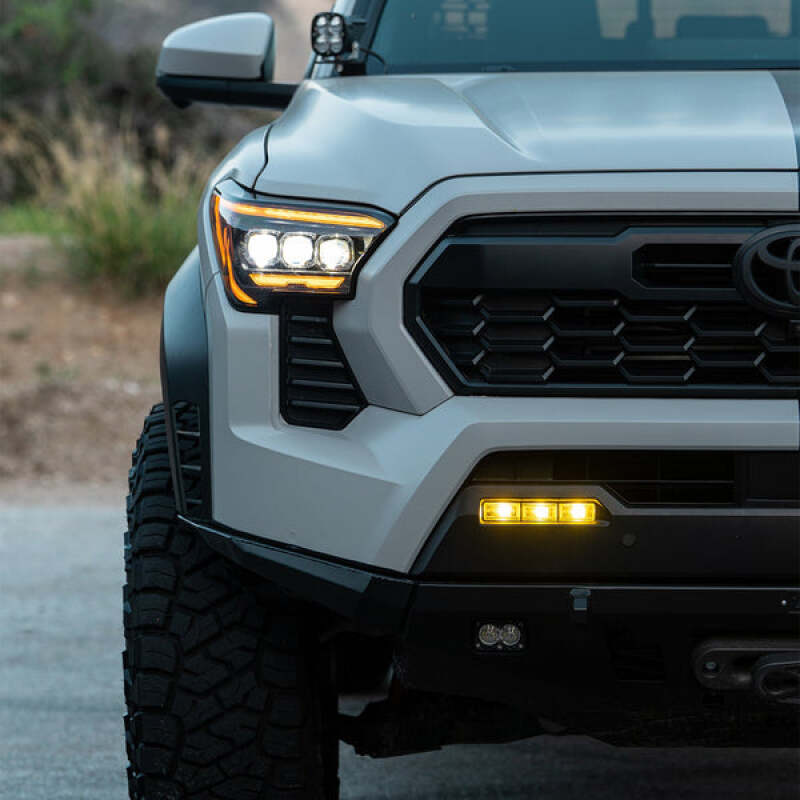 

AlphaRex 210083 - ARX210083 - AlphaRex Wiring Adapter 24-25 Toyota Tacoma/22-25 Tundra/Sequoia Dual Color LED Projector Fog Lights - Shipped in Europe - Tuningsupply.com
