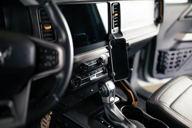 

DV8 Offroad CCBR-01 - DVECCBR-01 - DV8 21-23 Ford Bronco Center Console Molle Panels & Bridge - Shipped in Europe - Tuningsupply.com

