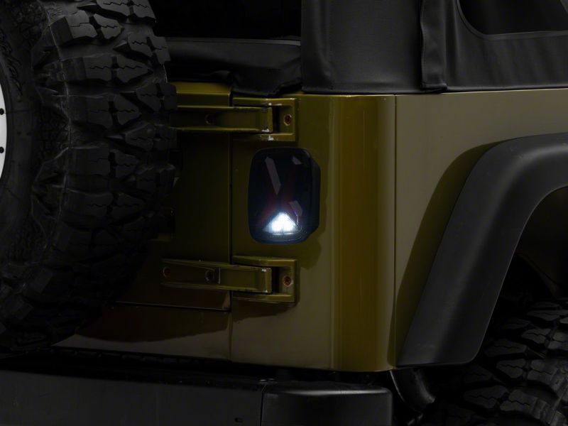 

Raxiom J177410 - RAXJ177410 - Raxiom 76-06 Jeep CJ7 Wrangler YJ & TJ Gladiator LED Tail Lights- Black Housing (Smoked Lens) - Shipped in Europe - Tuningsupply.com
