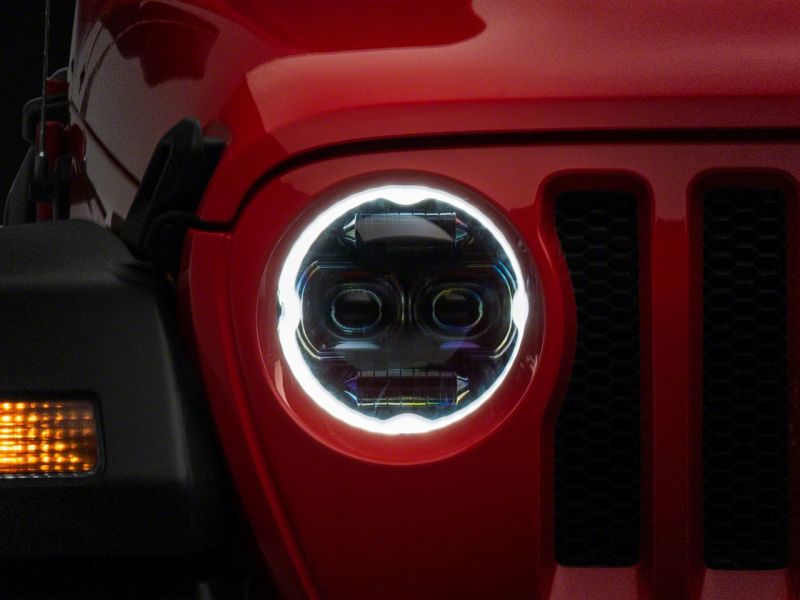 

Raxiom J171705 - RAXJ171705 - Raxiom 18-23 Jeep Wrangler JL Axial Series 9-In Angel Eye LED Headlights- Black Housing (Clear Lens) - Shipped in Europe - Tuningsupply.com
