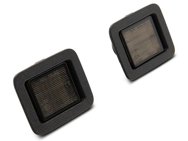 

Raxiom T549999 - RAXT549999 - Raxiom 07-14 Ford F-150 Axial Series LED License Plate Lamps- Smoked - Shipped in Europe - Tuningsupply.com
