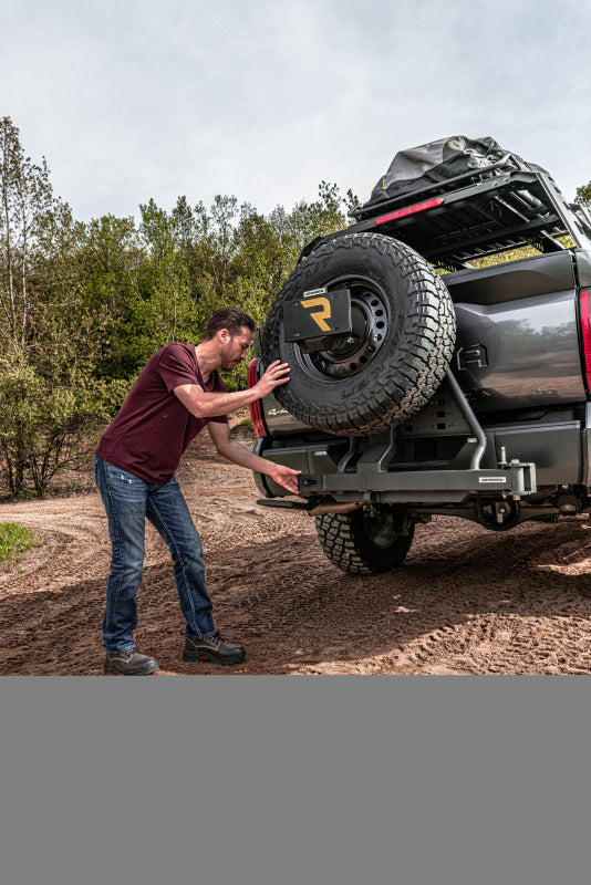

Go Rhino HC200T - GORHC200T - Go Rhino Swing-A-Way Hitch Mounted Tire Carrier (Lic. Plate Lights Not Included) - Textured Black - Shipped in Europe - Tuningsupply.com
