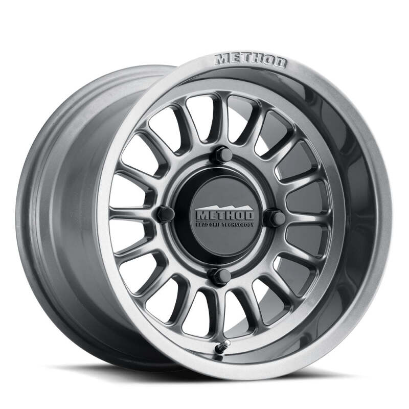 
  

Method Wheels  - MRWMR41157012852 - Method MR411 Bead Grip 15x7 / 5+2/38mm Offset / 5x4.5 / 72 CB Gloss Titanium Wheel - Shipped in Europe - Tuningsupply.com

