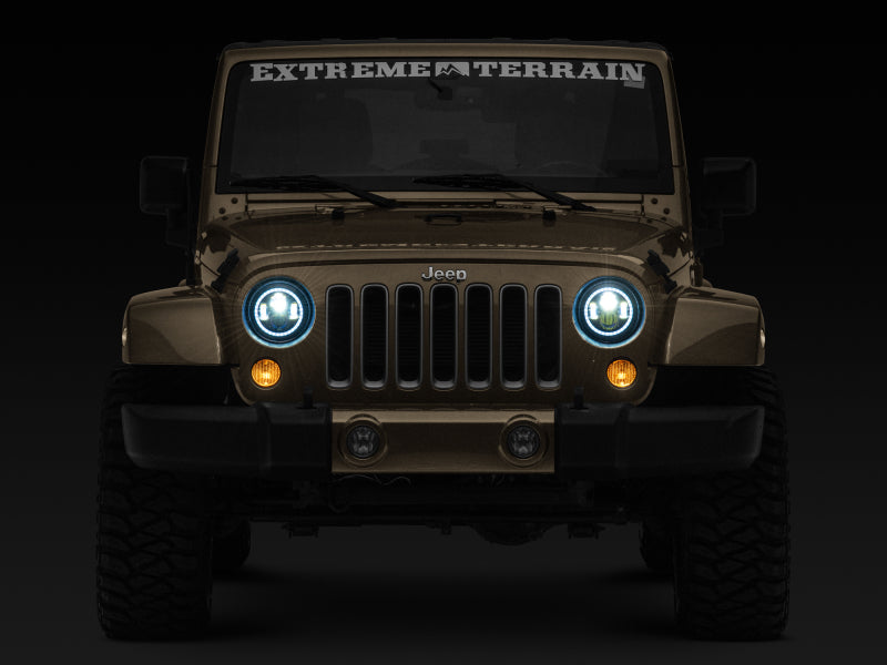 

Raxiom J142665 - RAXJ142665 - Raxiom 97-18 Jeep Wrangler TJ/JK Axial 7-Inch LED Headlights w/RGB Halo- Black Housing (Clear Lens) - Shipped in Europe - Tuningsupply.com
