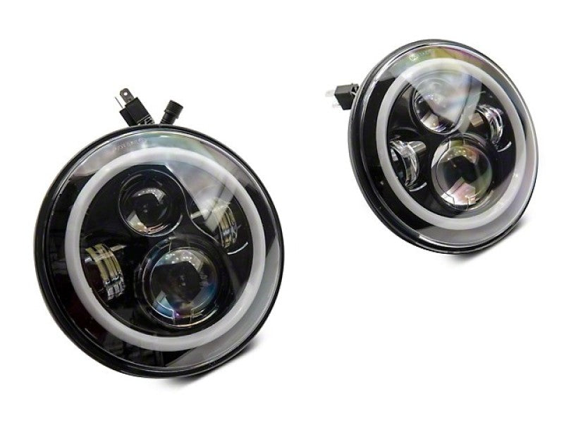 

Raxiom J142665 - RAXJ142665 - Raxiom 97-18 Jeep Wrangler TJ/JK Axial 7-Inch LED Headlights w/RGB Halo- Black Housing (Clear Lens) - Shipped in Europe - Tuningsupply.com
