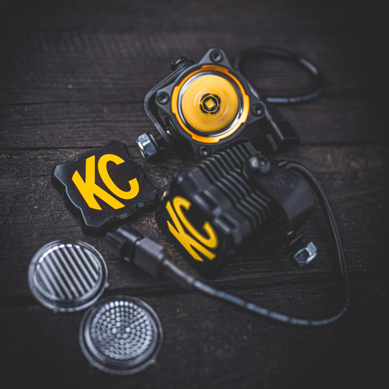 

KC HiLiTES  - KCL5328 - KC HiLiTES FLEX ERA 1 Single Light Cover ONLY (Black/Yellow KC Logo) - Shipped in Europe - Tuningsupply.com
