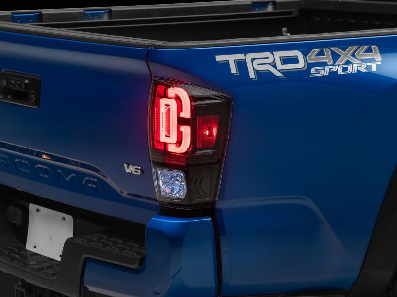 

Raxiom TT30331 - RAXTT30331 - Raxiom 16-23 Toyota Tacoma XW Series Sequential LED Tail Lights- Black Housing- Clear Lens - Shipped in Europe - Tuningsupply.com
