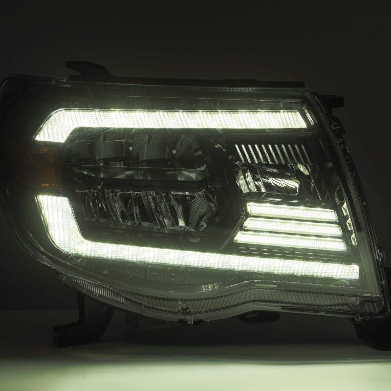 AlphaRex 05-11 Toyota Tacoma LUXX Crystal Headlights Plank Style Alpha Black w/Activation Light/DRL-tuningsupply.com