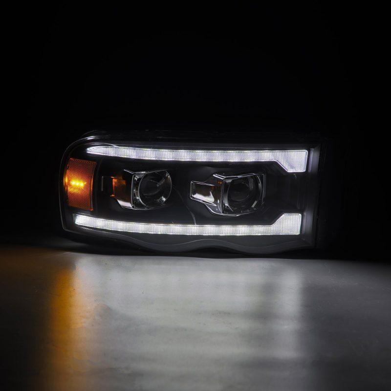 AlphaRex 02-05 Dodge Ram 1500 LUXX LED Proj Headlights Plank Style Black w/Activ Light/Seq Signal-tuningsupply.com