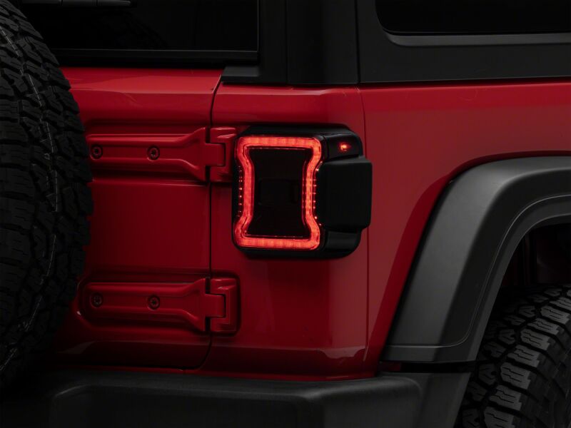 

Raxiom J181425 - RAXJ181425 - Raxiom 18-26 Jeep Wrangler JL LED Tail Lights- Red Housing- Smoked Lens - Shipped in Europe - Tuningsupply.com
