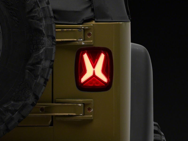 

Raxiom J177410 - RAXJ177410 - Raxiom 76-06 Jeep CJ7 Wrangler YJ & TJ Gladiator LED Tail Lights- Black Housing (Smoked Lens) - Shipped in Europe - Tuningsupply.com
