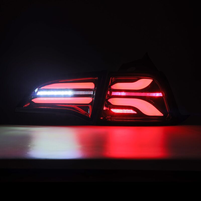 

AlphaRex 601010 - ARX601010 - AlphaRex 17-22 Tesla Model 3 PRO-Series LED Tail Lights Jet Black w/Seq Sig - Shipped in Europe - Tuningsupply.com

