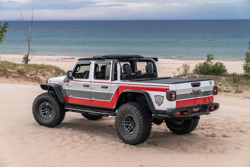 

Rugged Ridge 13595.14 - RUG13595.14 - Rugged Ridge 20-22 Jeep Gladiator JT Voyager Fastback Soft Top - Black Diamond - Shipped in Europe - Tuningsupply.com
