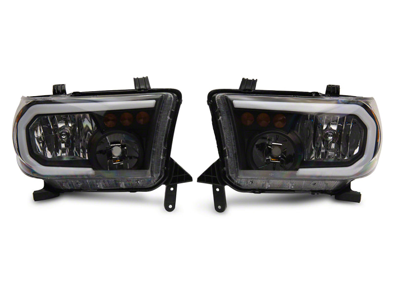 

Raxiom TU16004 - RAXTU16004 - Raxiom 07-13 Toyota Tundra Axial Series Headlights w/ LED Bar- Black Housing (Clear Lens) - Shipped in Europe - Tuningsupply.com
