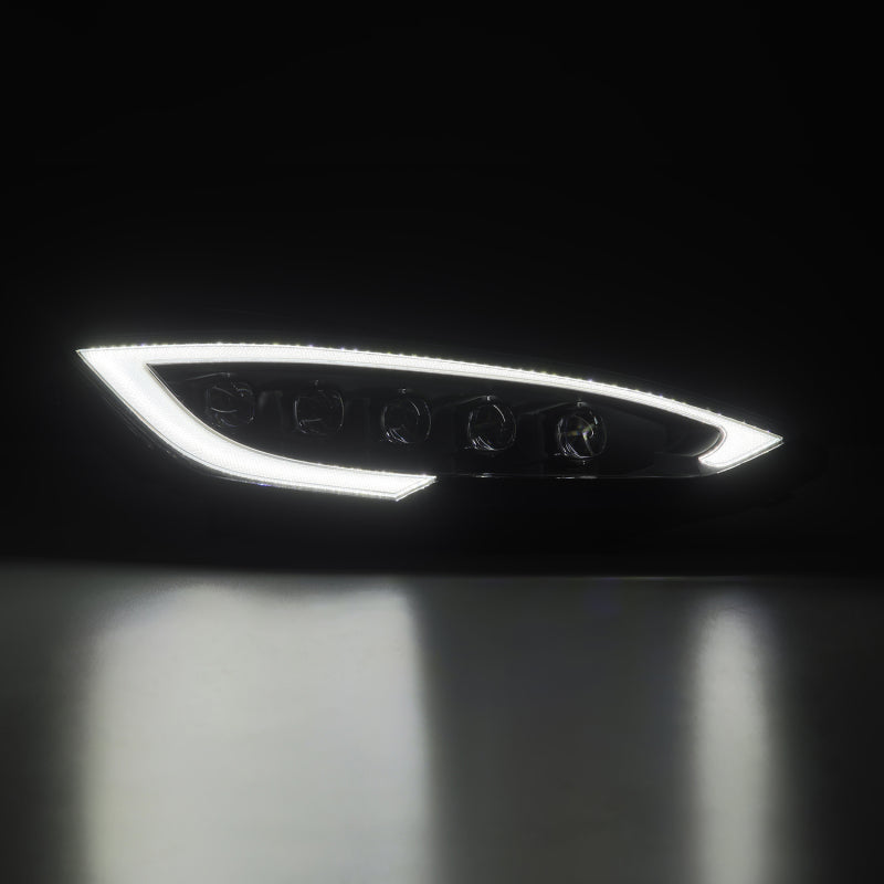

AlphaRex  - ARX880877 - AlphaRex 12-21 Tesla Model S NOVA-Series LED Proj Headlights Blk w/Activtn Light & Seq.Sig / SB DRL - Shipped in Europe - Tuningsupply.com
