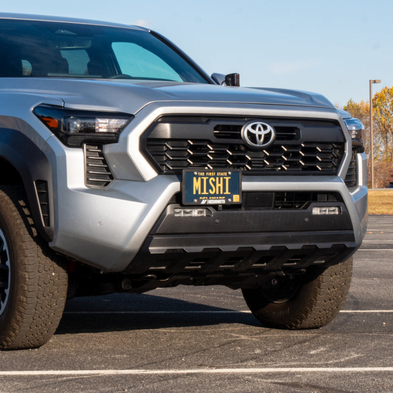 

Mishimoto MMLP-TAC-24 - MISMMLP-TAC-24 - Mishimoto 2024+ Toyota Tacoma License Plate Relocation Kit - Shipped in Europe - Tuningsupply.com
