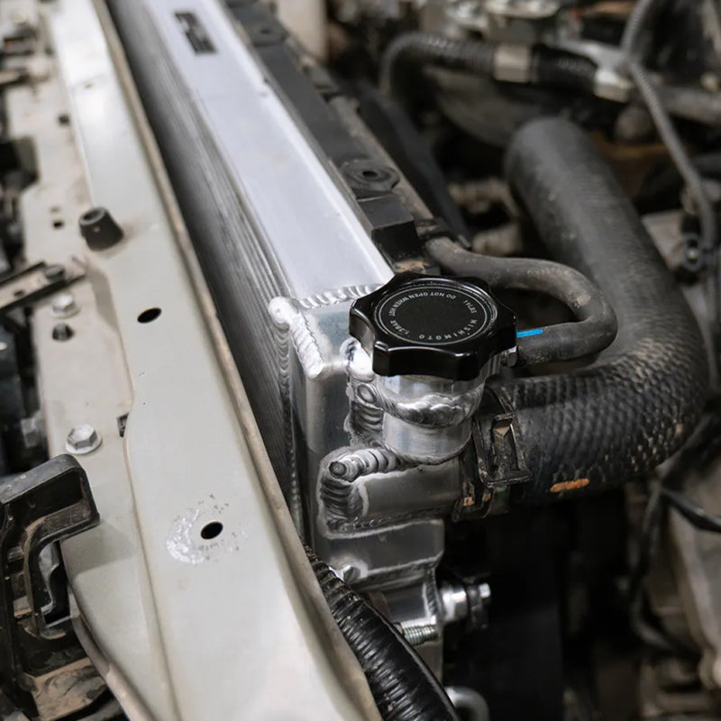 

Mishimoto MMRC-13-SMC - MISMMRC-13-SMC - Mishimoto High-Pressure 1.3 Bar Radiator Cap Small Non-Directional - Shipped in Europe - Tuningsupply.com
