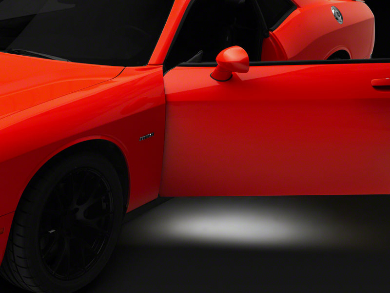 

Raxiom CH16605 - RAXCH16605 - Raxiom 15-23 Dodge Challenger Axial Series LED Door Courtesy Lamps - Shipped in Europe - Tuningsupply.com
