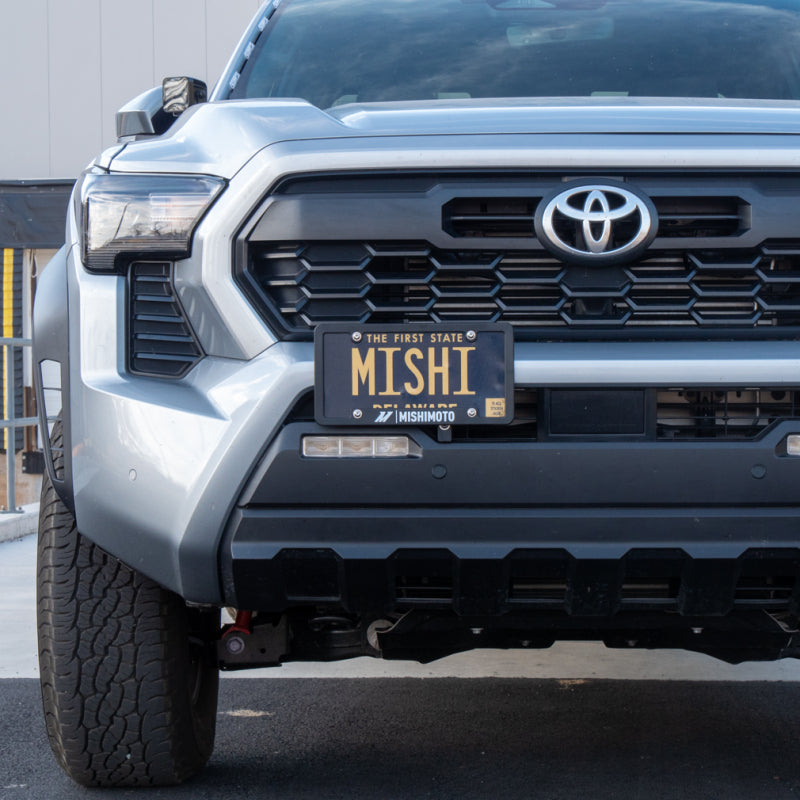 

Mishimoto MMLP-TAC-24 - MISMMLP-TAC-24 - Mishimoto 2024+ Toyota Tacoma License Plate Relocation Kit - Shipped in Europe - Tuningsupply.com
