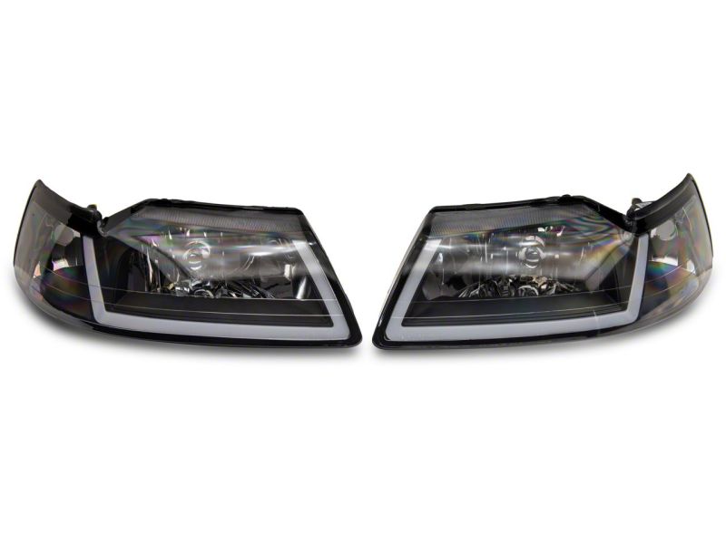 

Raxiom 422713 - RAX422713 - Raxiom 99-04 Ford Mustang Axial Series Headlights w/ Sequential LED Bar- Black Housing (Clear Lens) - Shipped in Europe - Tuningsupply.com
