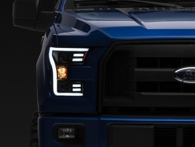 

Raxiom T542837 - RAXT542837 - Raxiom 15-17 Ford F-150 G3 Projector Headlights w/ LED Accent- Black Housing (Clear Lens) - Shipped in Europe - Tuningsupply.com
