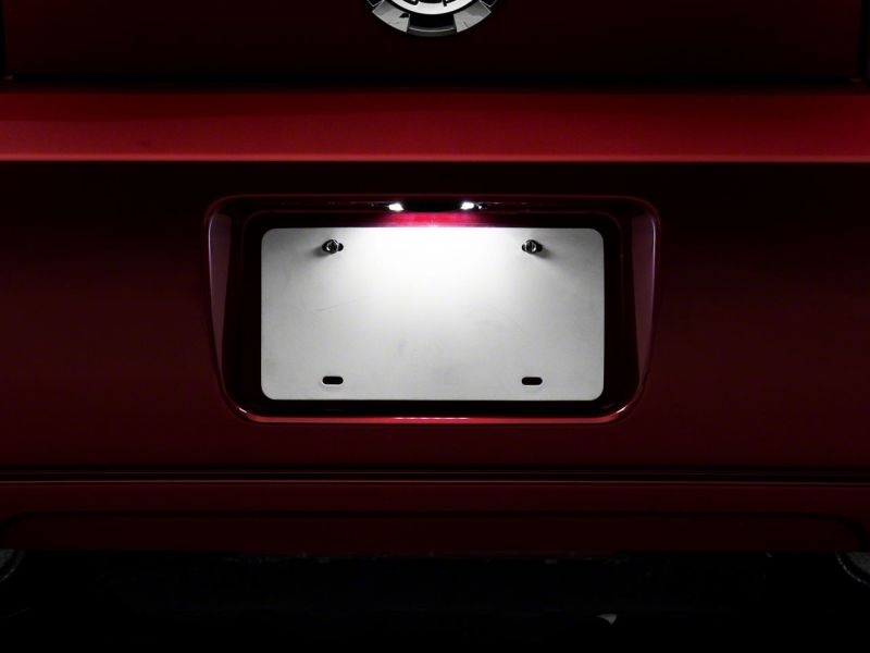 

Raxiom 413032 - RAX413032 - Raxiom 05-09 Ford Mustang Axial Series LED License Plate Lamps - Shipped in Europe - Tuningsupply.com
