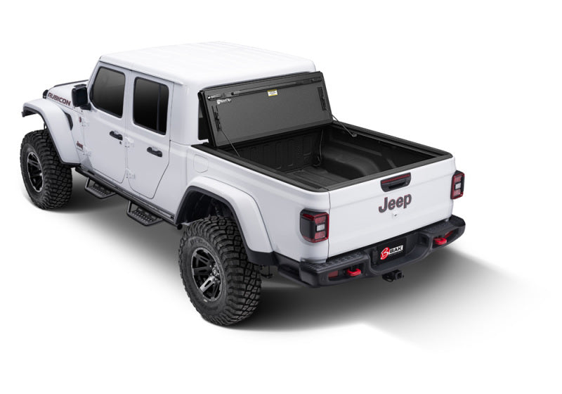 

BAK  - BAK448701 - BAK 2020 Jeep Gladiator 5ft Bed BAKFlip MX4 - Shipped in Europe - Tuningsupply.com
